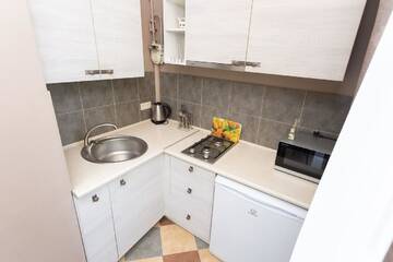 Фото номера Четырехместный номер эконом-класса Апартаменты Apartments Internazionalnaya г. Минск 6
