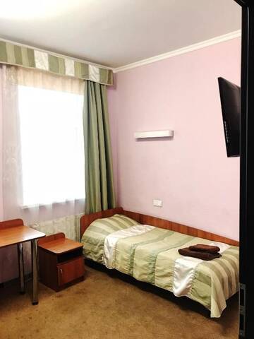 Фото номера Двухместный номер с 2 отдельными кроватями и собственной ванной комнатой Отель Белтаможсервис-Минск г. Минск 16