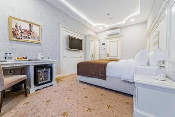 Фото номера Двухместный номер с 1 кроватью или 2 отдельными кроватями Отель Astoria Boutique Hotel г. Минск 4