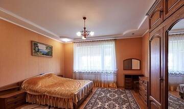 Фото номера Дом с 4 спальнями Дома для отпуска Kottedzh Semeinyi г. Минск 11
