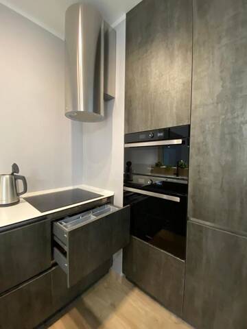 Фото Апартаменты LikeHome Скрыганова 4а г. Минск 4