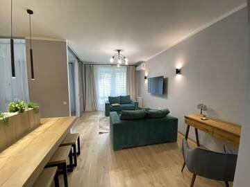 Фото Апартаменты LikeHome Скрыганова 4а г. Минск 5