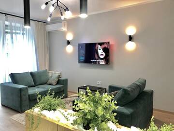 Фото Апартаменты LikeHome Скрыганова 4а г. Минск 1