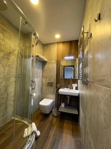 Фото Апартаменты LikeHome Скрыганова 4а г. Минск 3