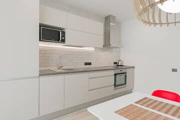 Фото номера Апартаменты с 1 спальней Апартаменты DanaTower Comfort г. Минск 12