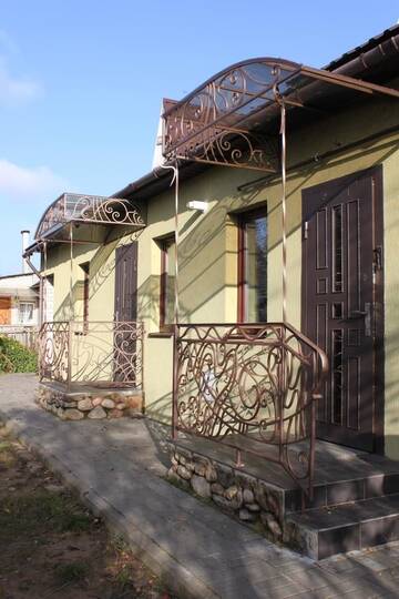 Фото номера Дом с 2 спальнями Дома для отпуска Дом с камином на берегу реки г. Минск 7