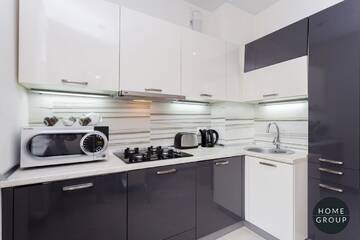 Фото номера Апартаменты с балконом Апартаменты Evogue Apartments г. Минск 14