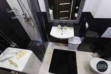 Фото номера Апартаменты с балконом Апартаменты Evogue Apartments г. Минск 31