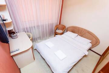 Фото номера Улучшенный семейный номер Апартаменты Apartland Romanovskaya Sloboda г. Минск 5