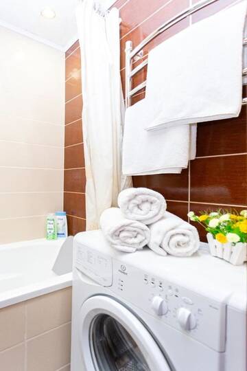 Фото номера Улучшенный семейный номер Апартаменты Apartland Romanovskaya Sloboda г. Минск 9