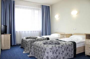 Фото номера Стандартный трехместный номер Отель East Time Hotel г. Минск 2