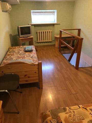 Фото номера Двухместный номер с 2 отдельными кроватями и ванной комнатой Мини-отель Olimpiyskiy г. Минск 2