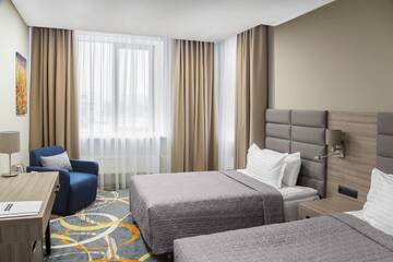 Фото номера Двухместный номер с 2 отдельными кроватями Отель Willing Hotel г. Минск 4