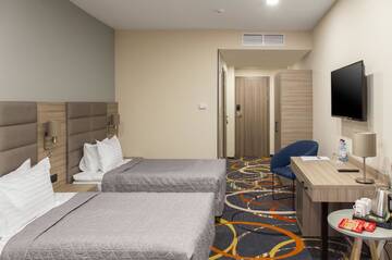 Фото номера Двухместный номер с 2 отдельными кроватями Отель Willing Hotel г. Минск 3