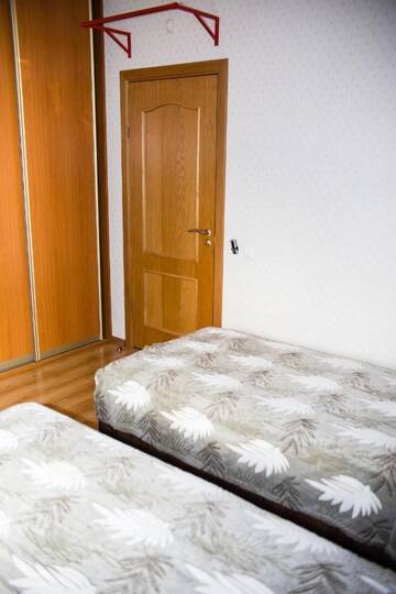 Фото номера Двухместный номер с 2 отдельными кроватями и балконом Хостелы Family Hostel г. Минск 2