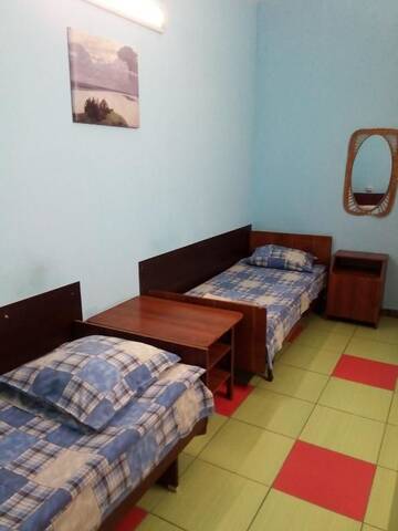 Фото номера Трехместный номер с общим туалетом Мини-отель Gostinitsa Chizhovka г. Минск 4