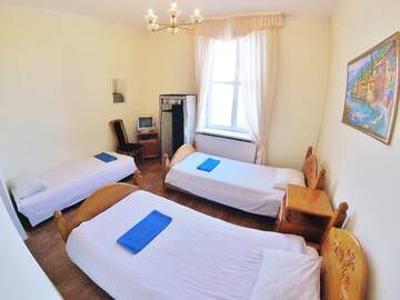Фото номера Трехместный номер с общей ванной комнатой Гостевой дом Grand Inn г. Минск 6