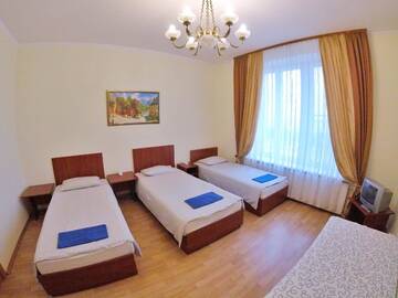 Фото номера Трехместный номер с общей ванной комнатой Гостевой дом Grand Inn г. Минск 2