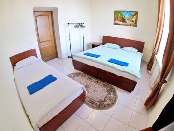 Фото номера Трехместный номер с общей ванной комнатой Гостевой дом Grand Inn г. Минск 3