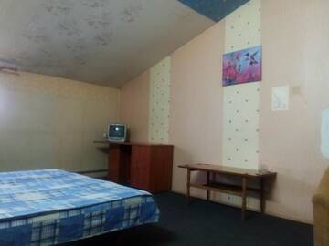 Фото номера Двухместный номер с двуспальной кроватью и дополнительной кроватью Мотели Kadm г. Минск 2